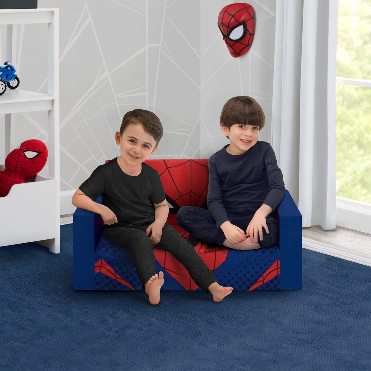 Delta Children Spider-Man Flip-Out Sofa opened as a comfy sleeper for naps