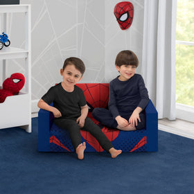 Delta Children Spider-Man Flip-Out Sofa opened as a comfy sleeper for naps