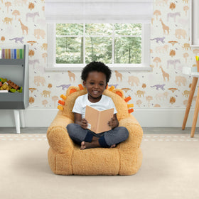 Delta Children Lion Cozee Buddy Chair orange side view, portable design