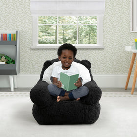 Delta Children Panda Cozee Buddy Chair black and white side view, portable