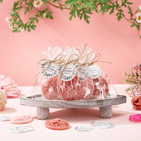 Demissle gift-ready soaps with white greeting card for guests.