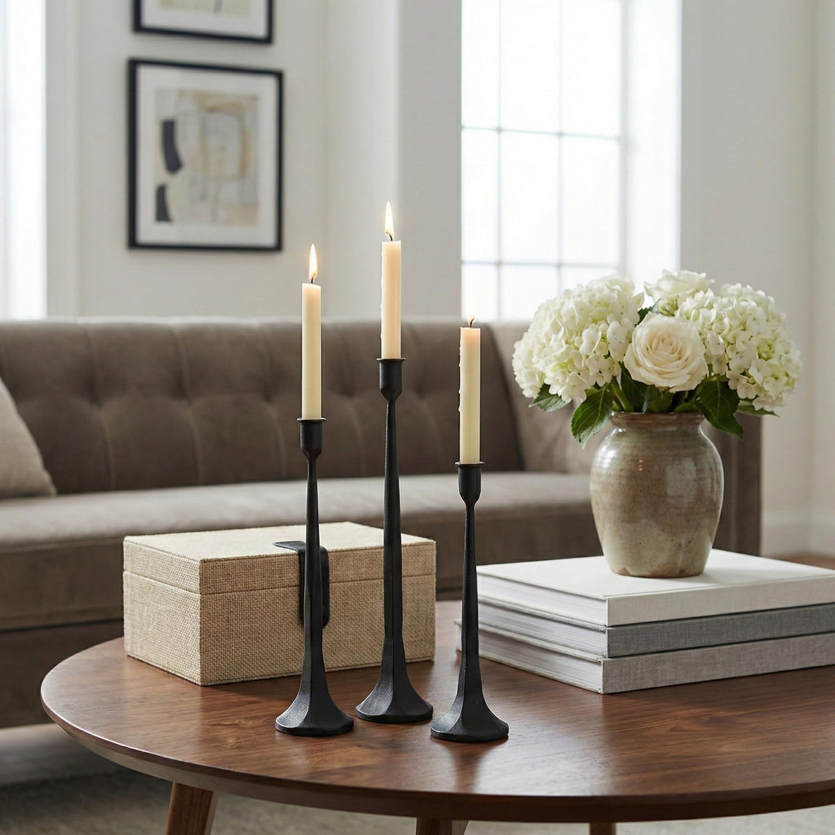 Denique iron taper candle holder arrangement shown on mantel with decor