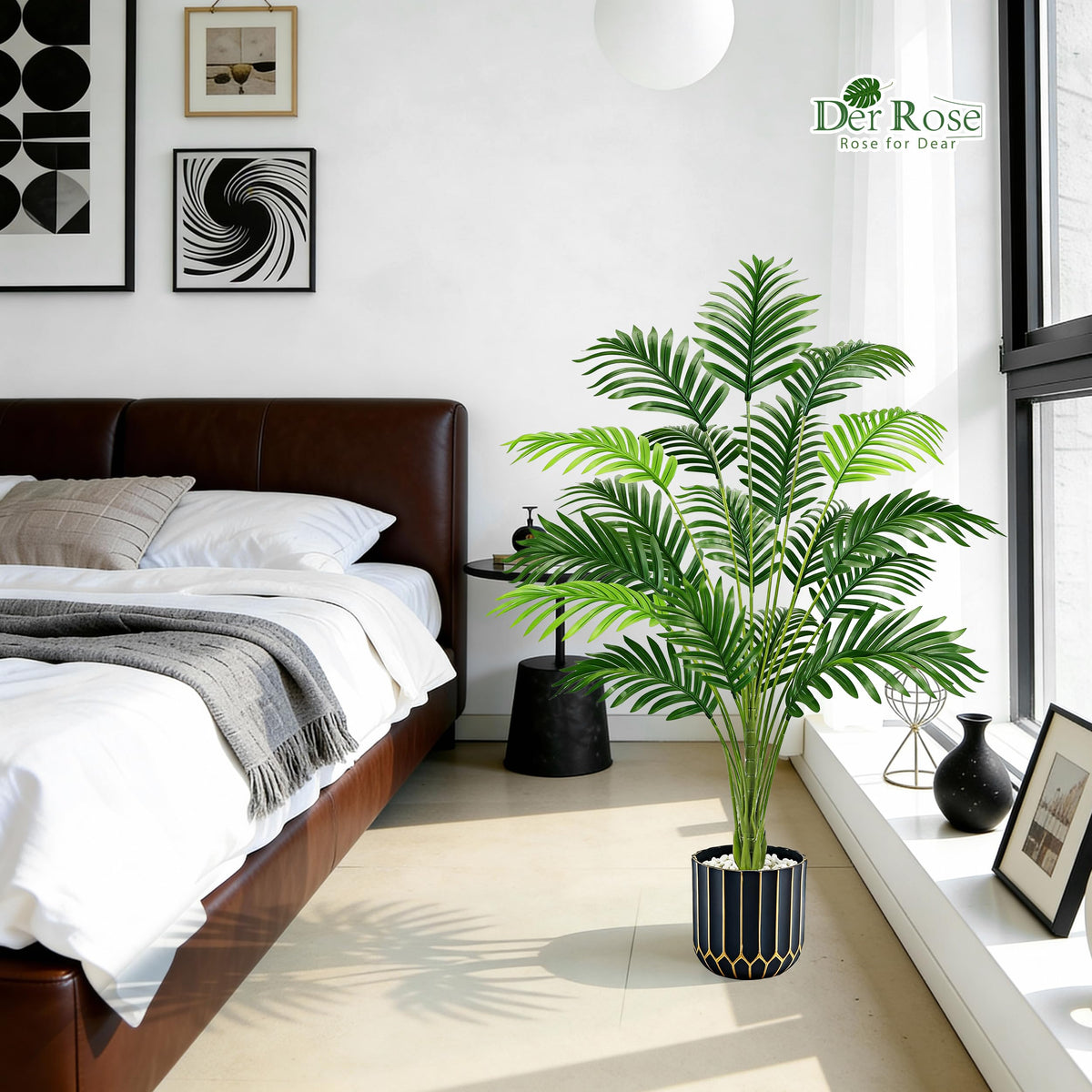 Der Rose palm tree placed on a covered outdoor porch for year-round decor.