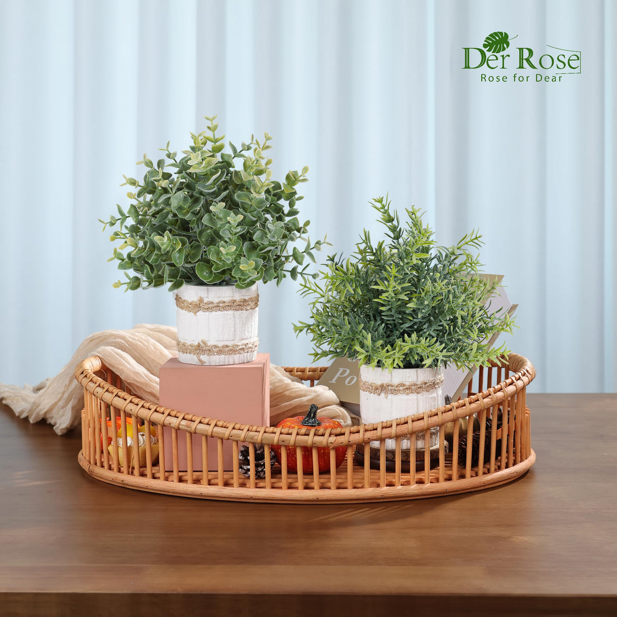 Der Rose artificial plants styled on bookshelf for cozy decor.