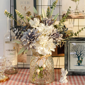 Der Rose navy blue dahlias with greenery in vase for office decor.