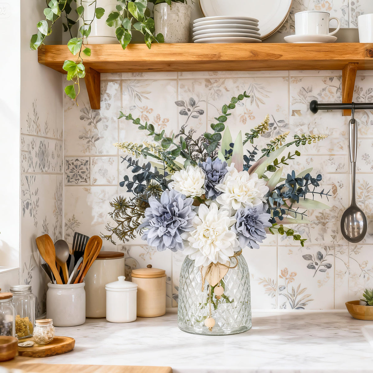 Der Rose navy blue dahlia arrangement in clear vase for centerpieces.