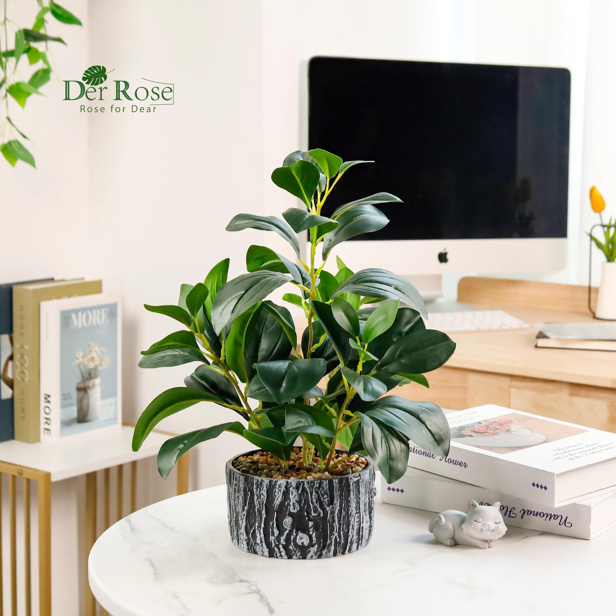 Der Rose fake plants with black and white striped pots enhance modern decor.