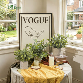 Der Rose kitchen shelf decor with sage green eucalyptus topiaries.