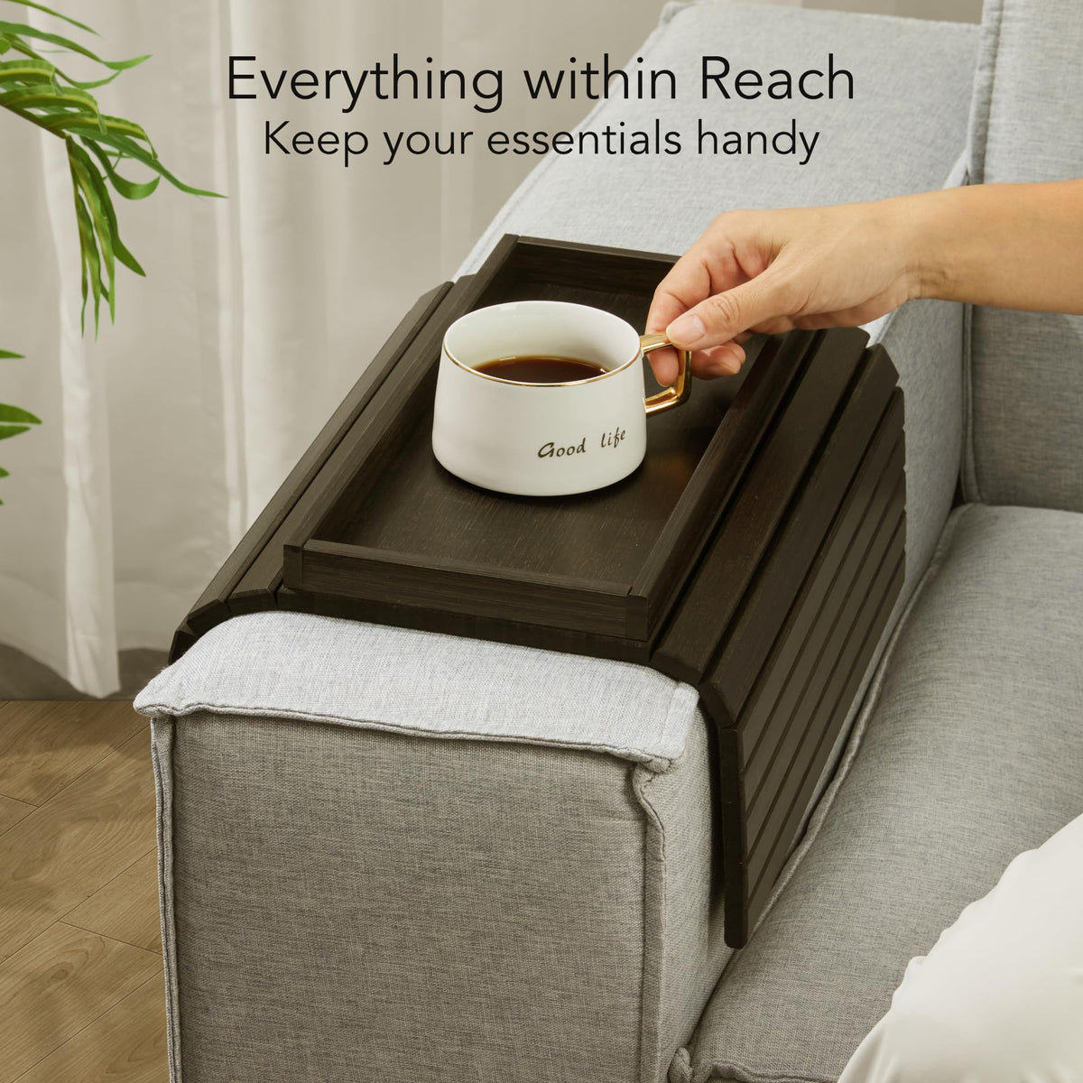 DETOR sofa arm tray in ebony bamboo finish elevates living room style.