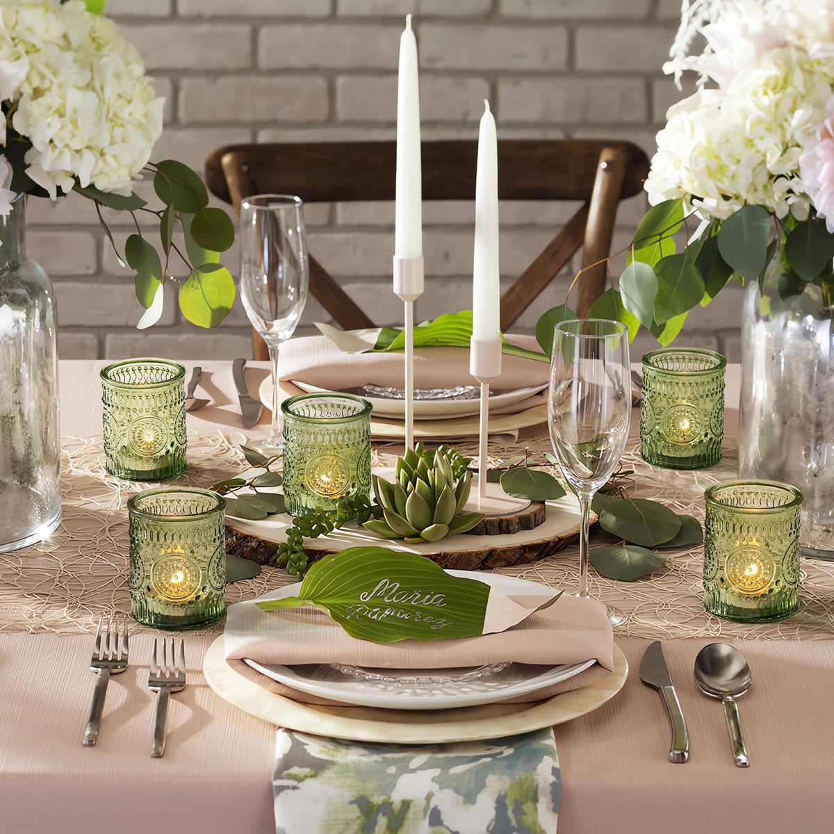 DEVI green votive set adds warm ambiance to bathrooms and dining spaces.