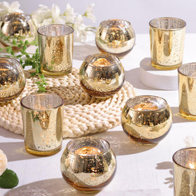 DEVI speckled mercury glass votives glow with warm ambience for weddings.