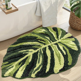 DEXI Monstera leaf bath rug in plush fibers adds natural style to your bathroom