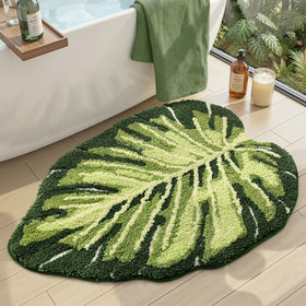 DEXI leaf bath rug with Monstera design adds natural charm and soft underfoot comfort.