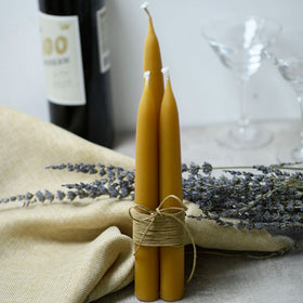 DEYBBY smokeless dripless candles on a mantel.