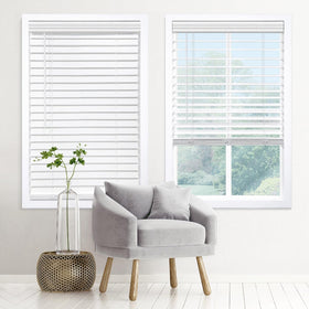 DEZ FURNISHINGS cordless faux wood blind closed for privacy and light control.