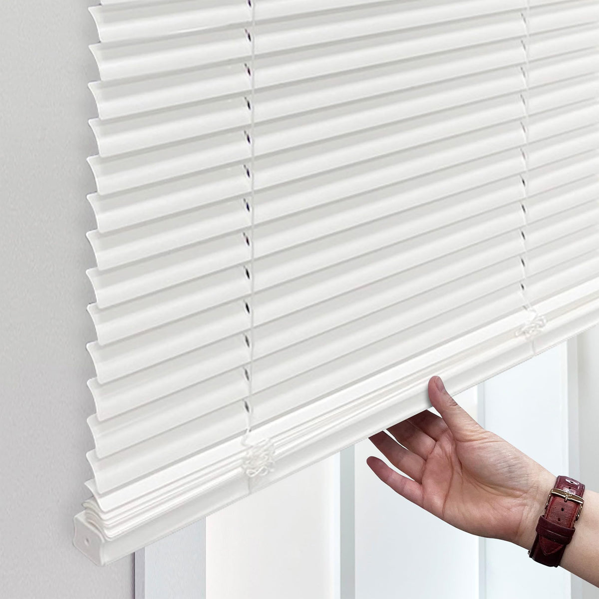 Hidden brackets on DEZ FURNISHINGS cordless blind for seamless installation
