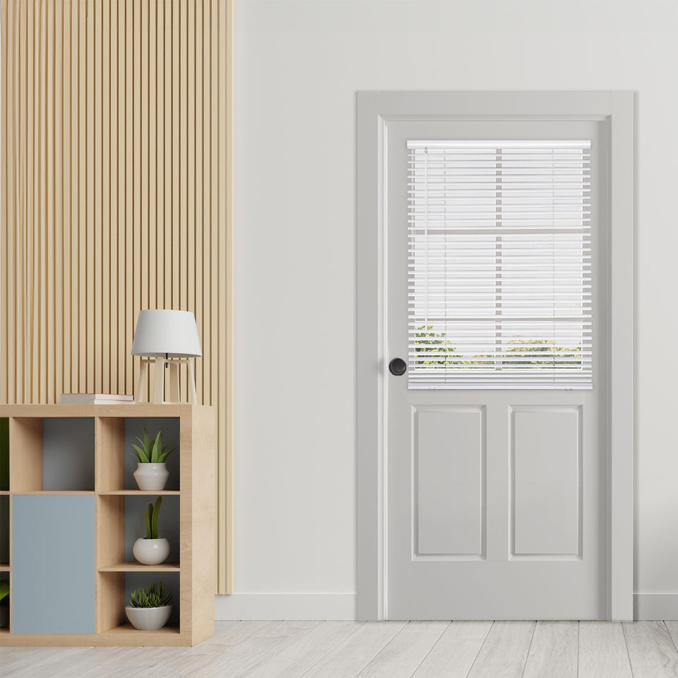 DEZ FURNISHINGS cordless no-tools 1-inch magnet mini blinds on metal door offer easy privacy.