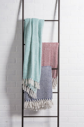 DII basket weave throw folded for compact storage and display.
