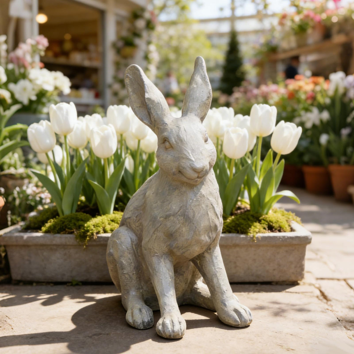 DiliComing grey resin rabbit statue for outdoor garden use.