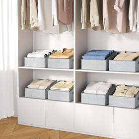 DIMJ shelf organizer bin on a high shelf for easy retrieval