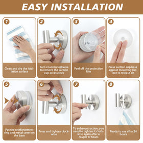 Disbam suction cup hooks on glass provide towel hanging space.