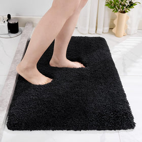 Disolla black bathroom rug 17x24 shows plush texture and slip resistance for bathroom floors.