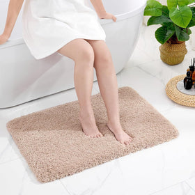 Disolla contour toilet mat demonstrates tailored fit for corner spaces