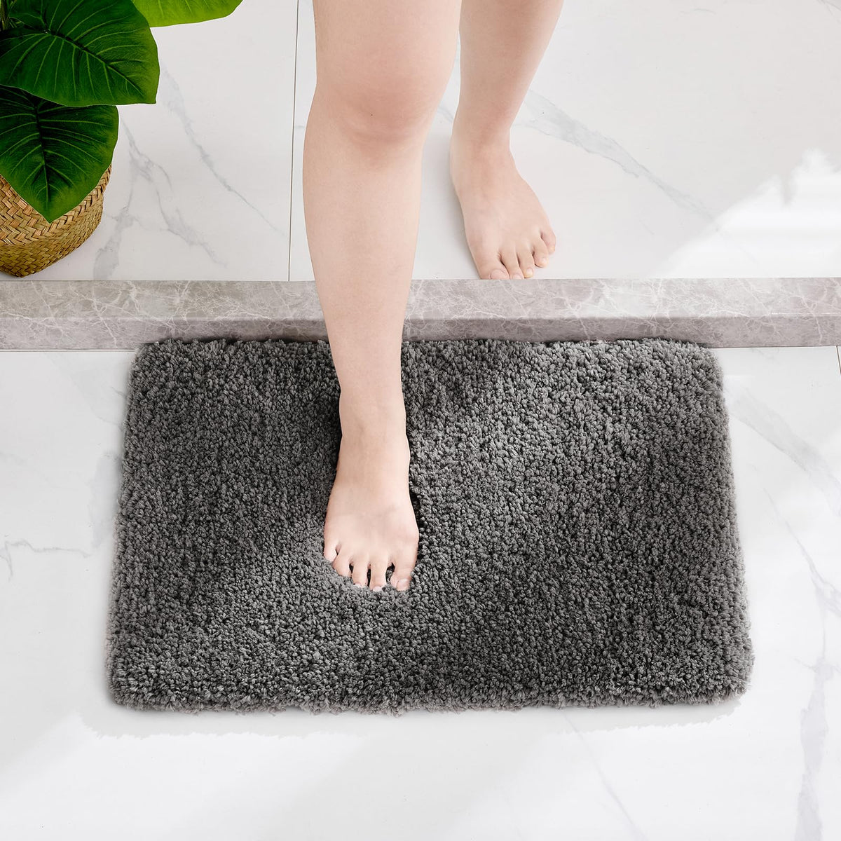 Disolla dark grey bath mat complements modern bathroom decor