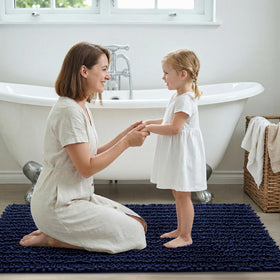 Disolla 24x36 mat by tub suggests versatile placement.