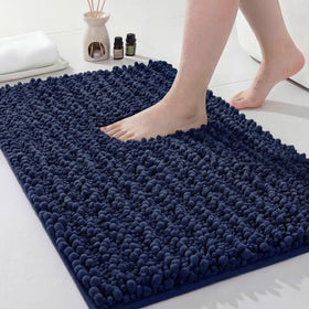 Disolla Navy Blue Bathroom Rug 20x32 in showcases plush chenille design for soft footfall.
