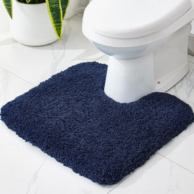 Disolla navy toilet mat front view with plush, absorbent surface.