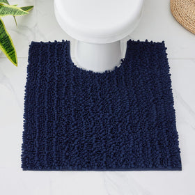 Navy blue chenille bath mat complements contemporary bathroom decor