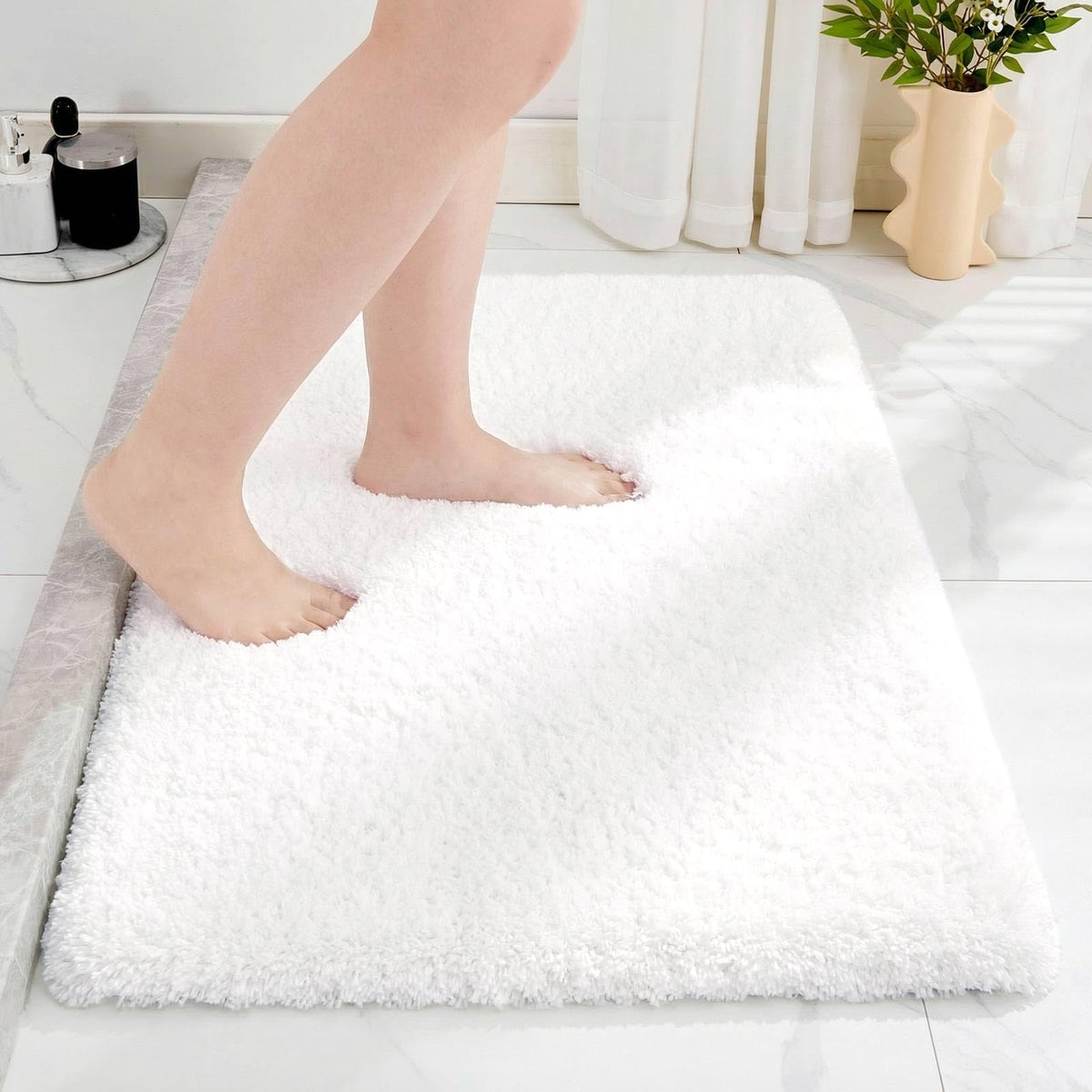 Disolla White Bathroom Rug 20x32 with a clean, non-slip surface for safe stepping.