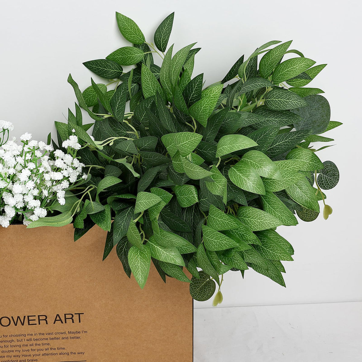 Silk greenery stems perfect for elegant centerpieces and table decor.