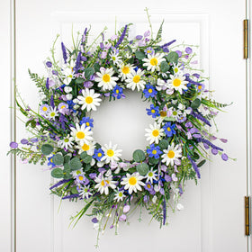 DIYFLORU entryway wreath combines blue blooms with greenery for year round appeal.