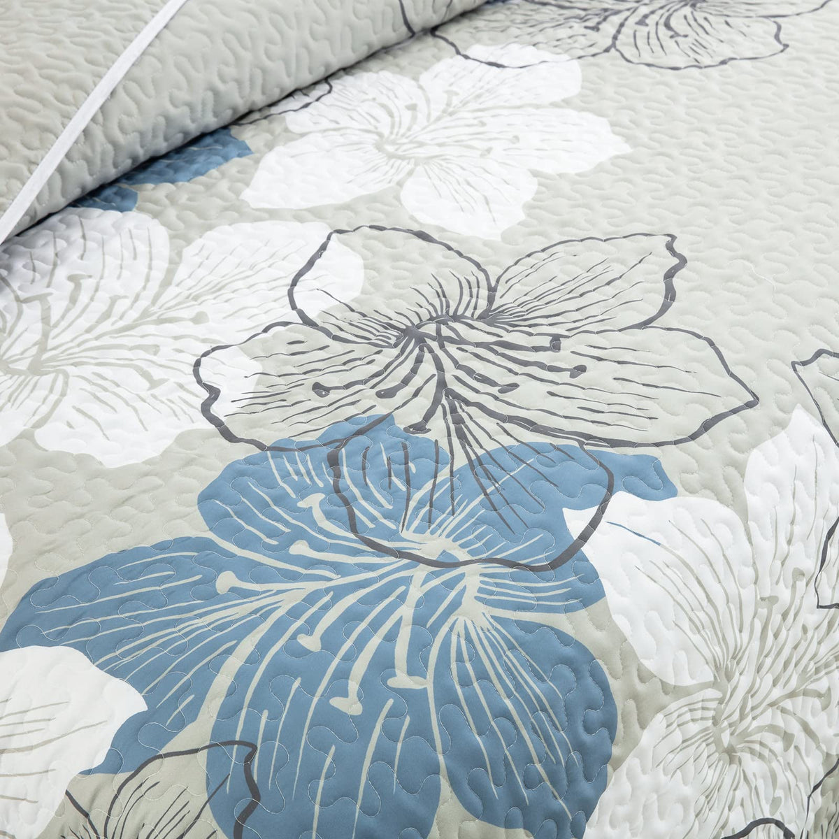 DJY lazy morning in bed with cozy quilt and shams.