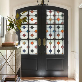 DKTIE bathroom window film diffuses light while protecting privacy.