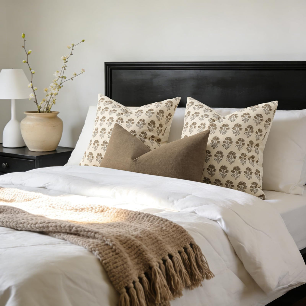 DKwizme cottage-style pillow cover adds cozy charm to bedrooms.