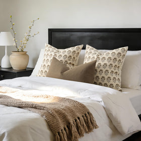 DKwizme cottage-style pillow cover adds cozy charm to bedrooms.
