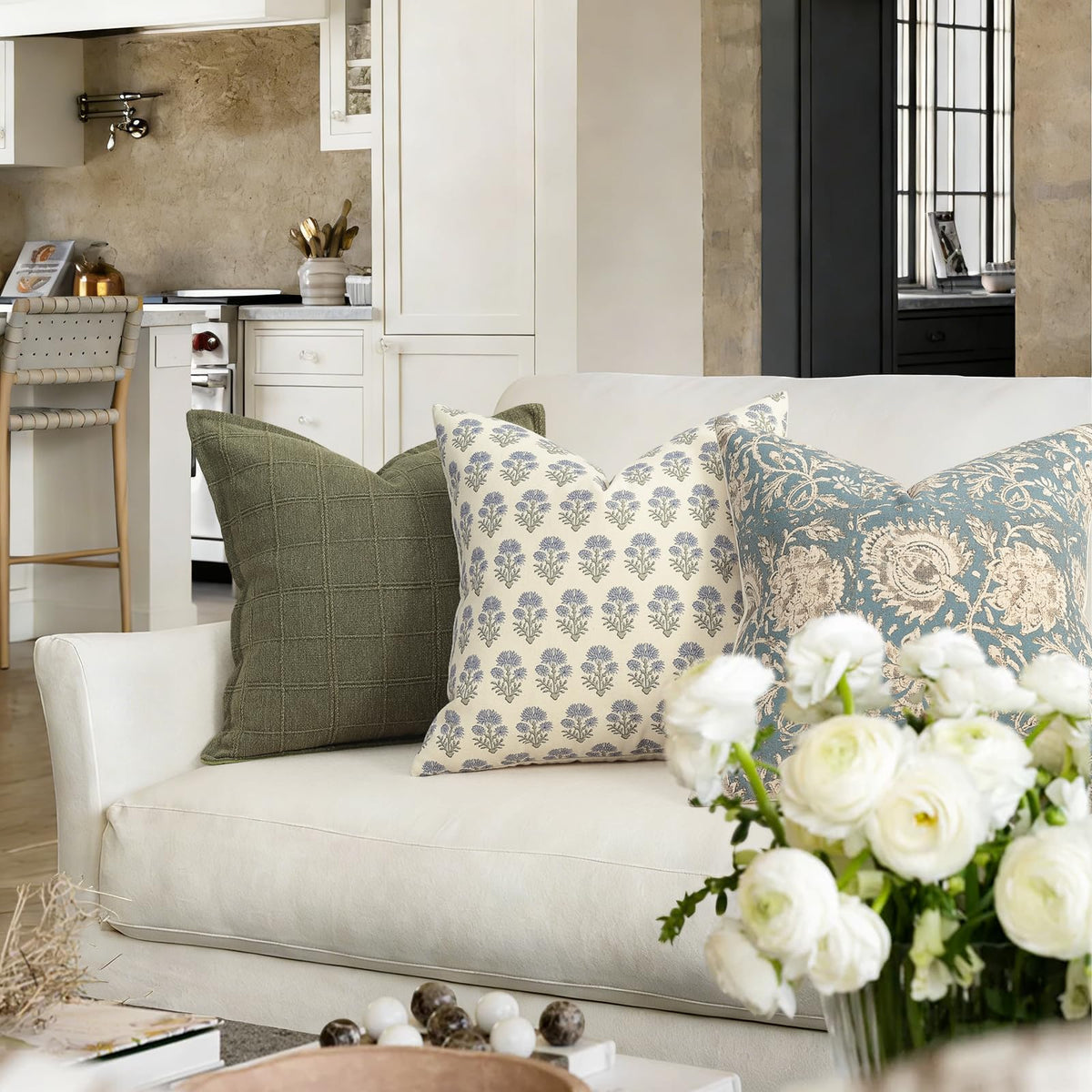 Pillow cover on a bed enhances cottage style and comfort.