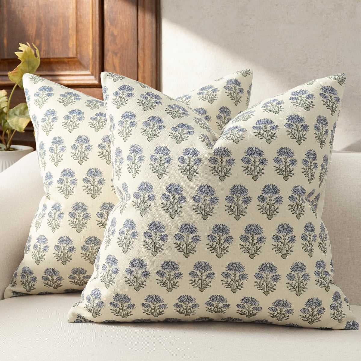 DKwizme farmhouse floral pillow cover in dusty blue adds rustic charm to living rooms.