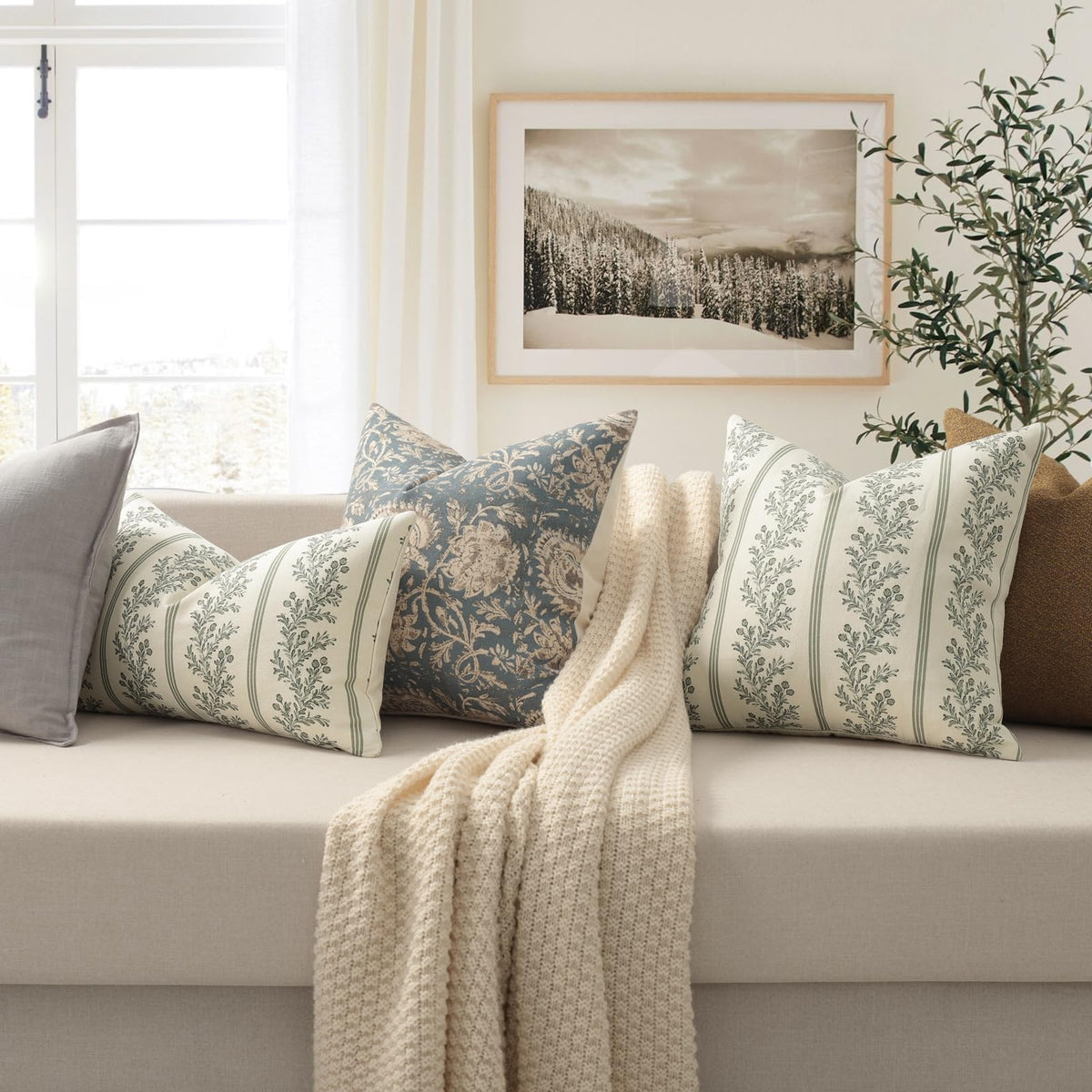 Two DKwizme vintage pillow covers packaged as a set.