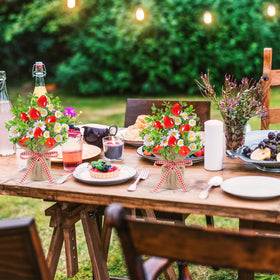 Dlerom red plaid bow on strawberry plant adds festive charm