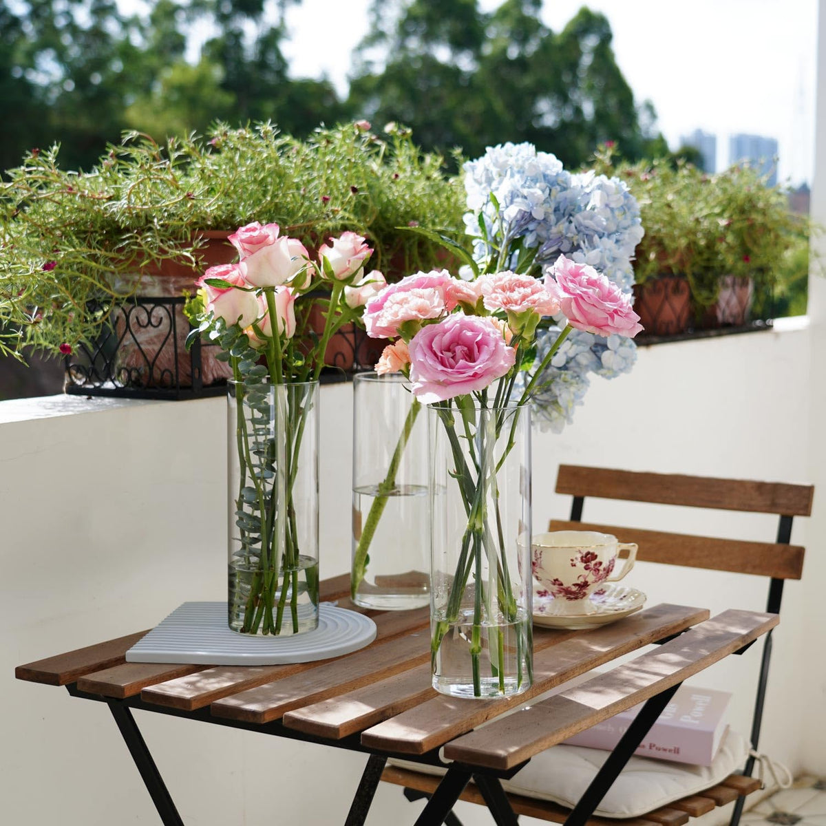 DNANAOL glass cylinder vases used as floating candle holders