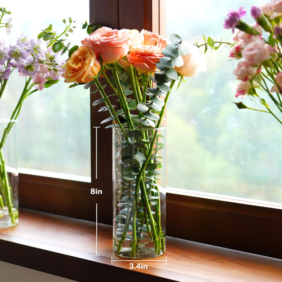 DNANAOL 8-inch cylinder vase with floating candles for a modern look.