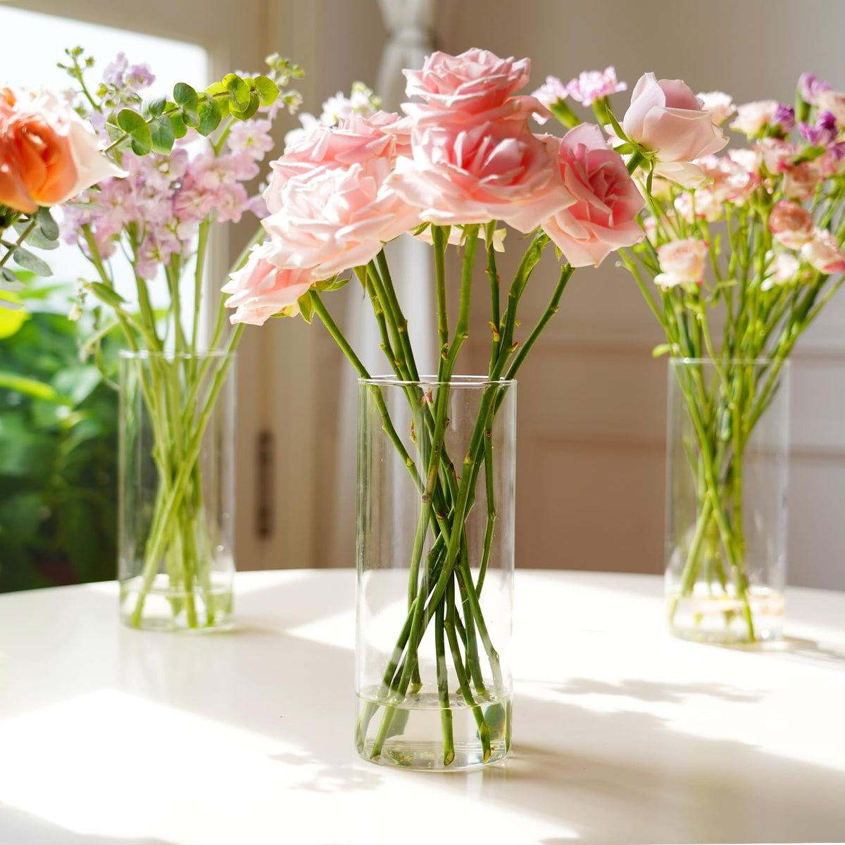 DNANAOL thick, sturdy glass cylinder vase with a stable base.