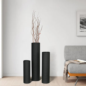 Dnnnii dining-room setup featuring tall vases for height and balance.