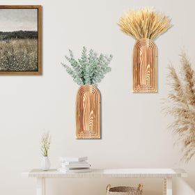 Dnnnii two-pack wall vase display in a hallway.