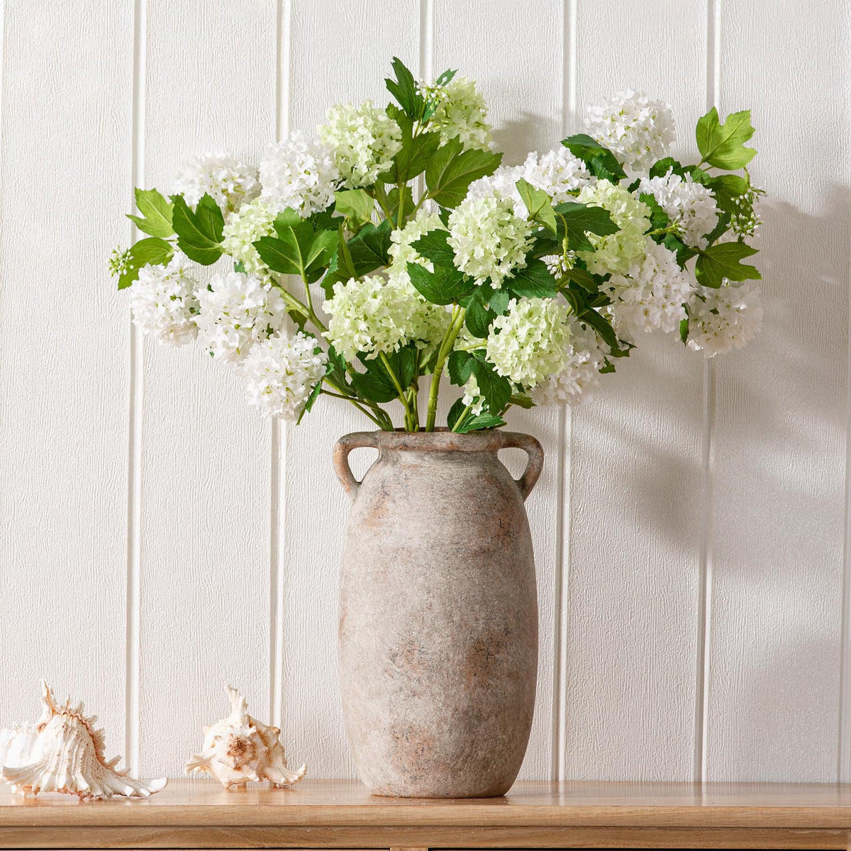 Dobbyby hand-painted vase suited for living room decor and gift-worthy arrangements.