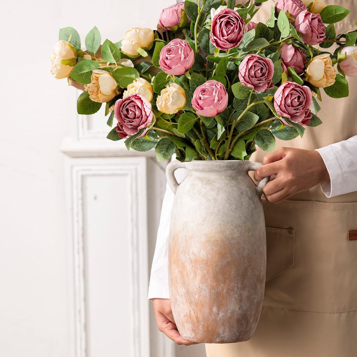 Dobbyby hand-painted vase showcases rustic texture for artisanal home styling.